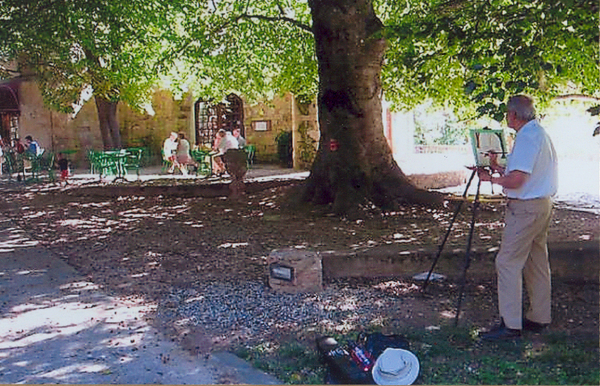 Len painting "Early for Dinner" at Alet-les-Bains in 2006
